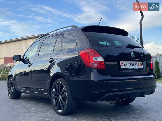 Черный Шкода Фабия, объемом двигателя 1.4 л и пробегом 179 тыс. км за 7750 $, фото 14 на Automoto.ua