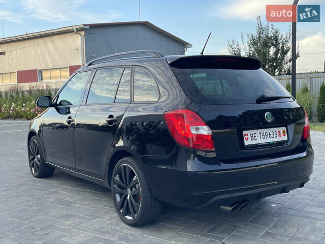 Черный Шкода Фабия, объемом двигателя 1.4 л и пробегом 179 тыс. км за 7750 $, фото 12 на Automoto.ua