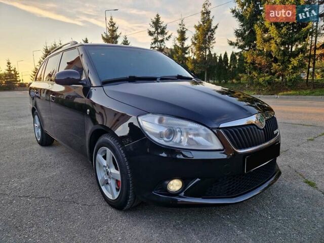 Черный Шкода Фабия, объемом двигателя 1.4 л и пробегом 225 тыс. км за 8600 $, фото 4 на Automoto.ua