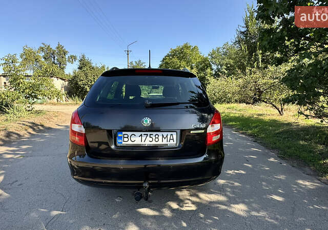 Черный Шкода Фабия, объемом двигателя 1.2 л и пробегом 266 тыс. км за 5600 $, фото 3 на Automoto.ua