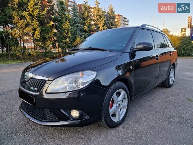 Черный Шкода Фабия, объемом двигателя 1.4 л и пробегом 225 тыс. км за 8600 $, фото 16 на Automoto.ua