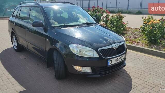 Шкода Фабия 2012 в Полтаве на Automoto.ua Черный Шкода Фабия, объемом двигателя 1.6 л и пробегом 211 тыс. км за 6500 $, фото 9 на Automoto.ua