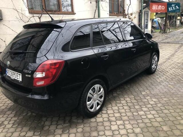 Черный Шкода Фабия, объемом двигателя 1.6 л и пробегом 257 тыс. км за 6000 $, фото 1 на Automoto.ua
