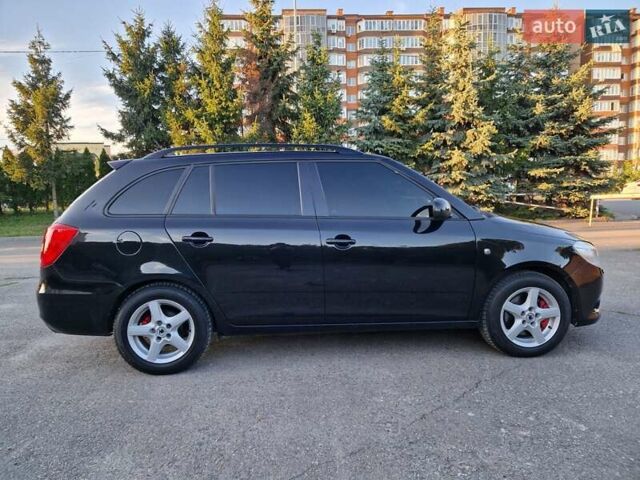 Черный Шкода Фабия, объемом двигателя 1.4 л и пробегом 225 тыс. км за 8600 $, фото 7 на Automoto.ua