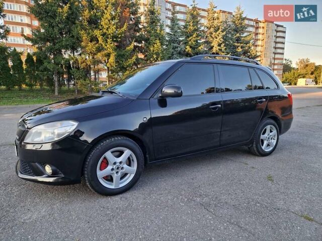 Черный Шкода Фабия, объемом двигателя 1.4 л и пробегом 225 тыс. км за 8600 $, фото 19 на Automoto.ua