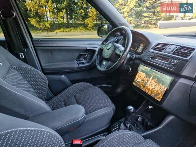Черный Шкода Фабия, объемом двигателя 1.4 л и пробегом 225 тыс. км за 8600 $, фото 24 на Automoto.ua