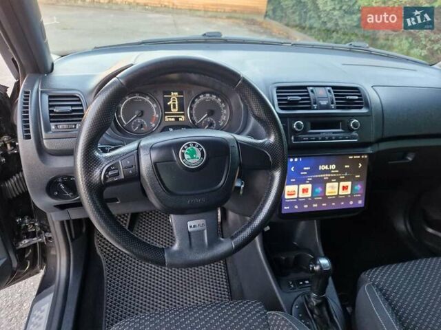 Черный Шкода Фабия, объемом двигателя 1.4 л и пробегом 225 тыс. км за 8600 $, фото 22 на Automoto.ua