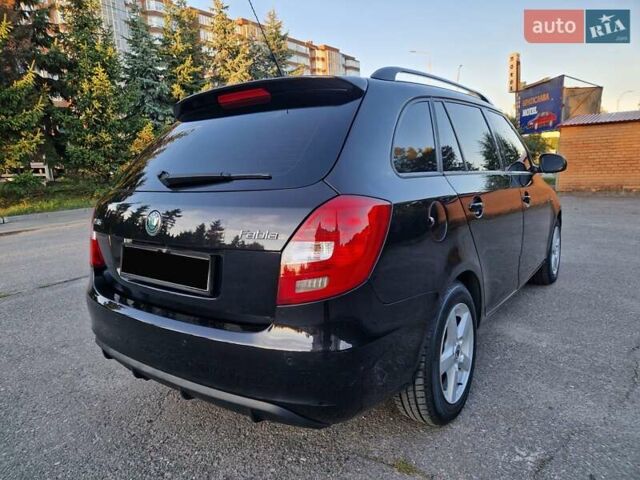 Черный Шкода Фабия, объемом двигателя 1.4 л и пробегом 225 тыс. км за 8600 $, фото 6 на Automoto.ua