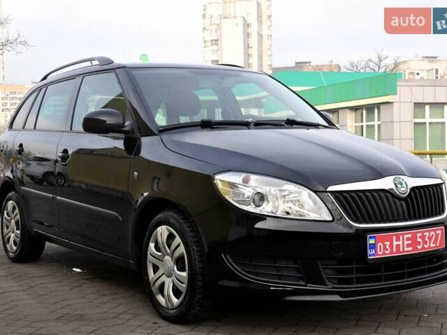 Черный Шкода Фабия, объемом двигателя 1.2 л и пробегом 196 тыс. км за 5700 $, фото 6 на Automoto.ua