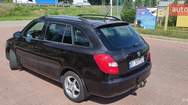 Шкода Фабия 2012 в Полтаве на Automoto.ua Черный Шкода Фабия, объемом двигателя 1.6 л и пробегом 211 тыс. км за 6500 $, фото 5 на Automoto.ua