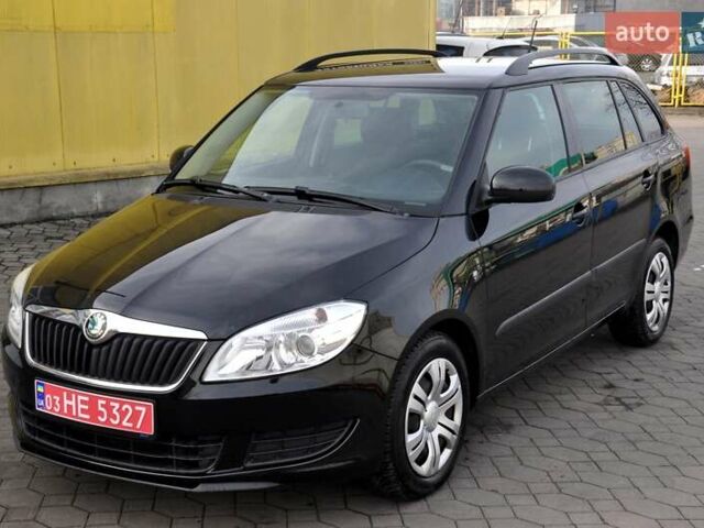 Черный Шкода Фабия, объемом двигателя 1.2 л и пробегом 196 тыс. км за 5700 $, фото 1 на Automoto.ua