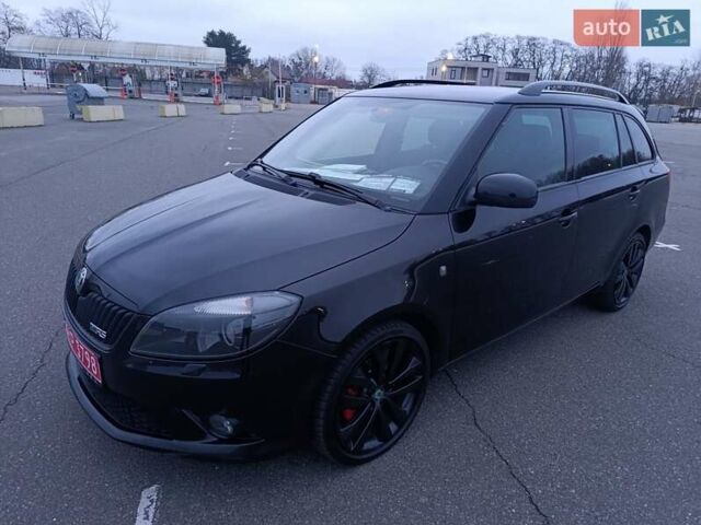 Черный Шкода Фабия, объемом двигателя 1.4 л и пробегом 203 тыс. км за 10500 $, фото 1 на Automoto.ua