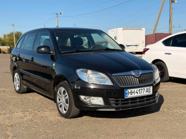 Черный Шкода Фабия, объемом двигателя 1.6 л и пробегом 218 тыс. км за 7400 $, фото 1 на Automoto.ua
