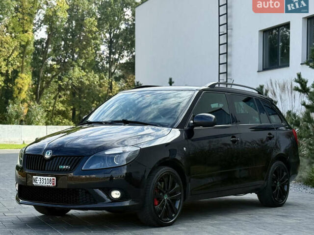 Черный Шкода Фабия, объемом двигателя 1.4 л и пробегом 203 тыс. км за 8699 $, фото 2 на Automoto.ua