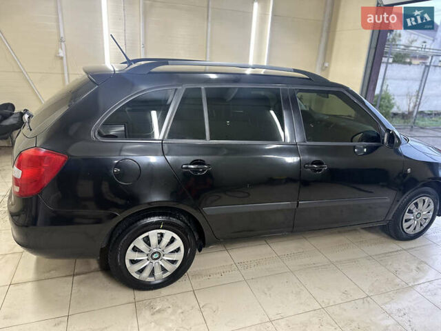 Чорний Шкода Фабія, об'ємом двигуна 1.6 л та пробігом 296 тис. км за 5450 $, фото 2 на Automoto.ua