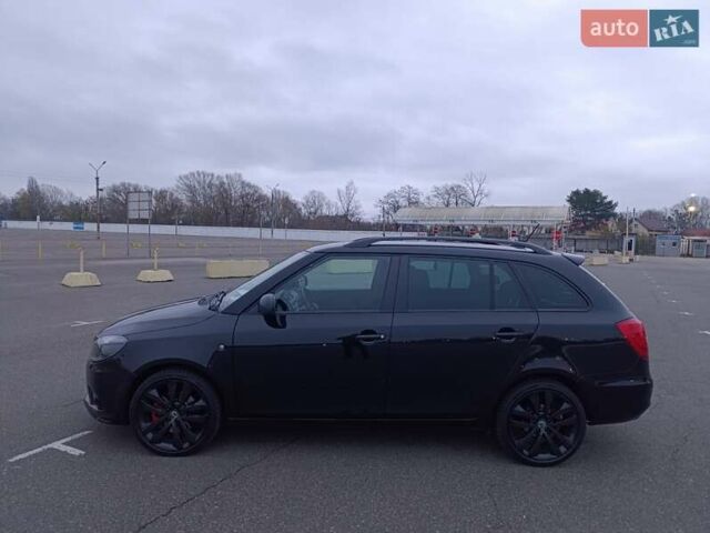 Черный Шкода Фабия, объемом двигателя 1.4 л и пробегом 203 тыс. км за 10500 $, фото 5 на Automoto.ua