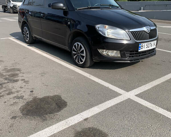 Черный Шкода Фабия, объемом двигателя 1.2 л и пробегом 287 тыс. км за 5700 $, фото 1 на Automoto.ua