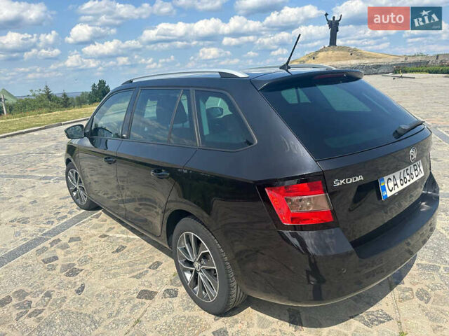 Черный Шкода Фабия, объемом двигателя 1.4 л и пробегом 293 тыс. км за 8200 $, фото 5 на Automoto.ua