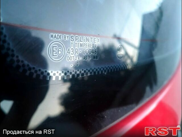 Красный Шкода Фабия, объемом двигателя 1.4 л и пробегом 250 тыс. км за 3800 $, фото 4 на Automoto.ua