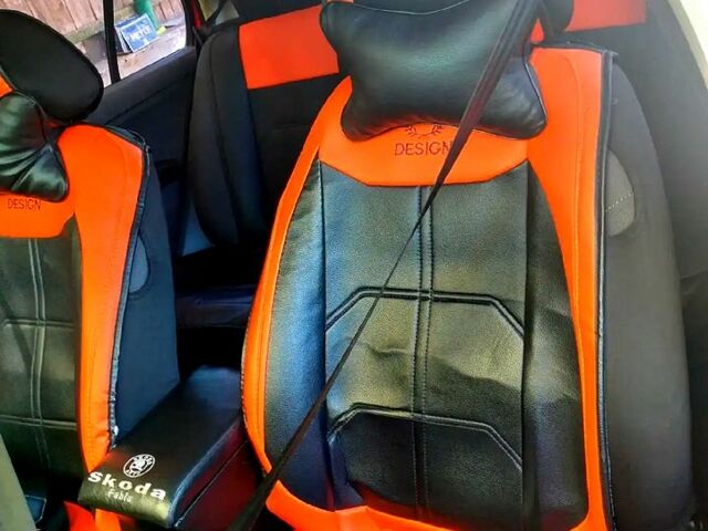 Красный Шкода Фабия, объемом двигателя 1.4 л и пробегом 250 тыс. км за 3800 $, фото 6 на Automoto.ua