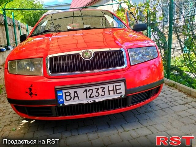 Красный Шкода Фабия, объемом двигателя 1.4 л и пробегом 250 тыс. км за 3800 $, фото 10 на Automoto.ua