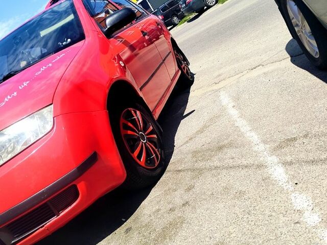 Красный Шкода Фабия, объемом двигателя 1.4 л и пробегом 250 тыс. км за 3800 $, фото 1 на Automoto.ua