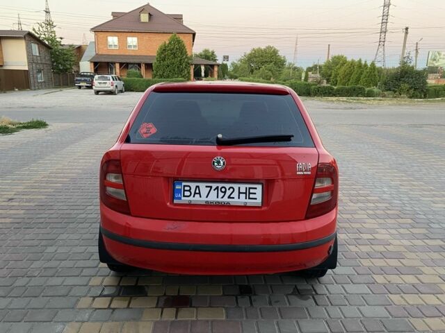 Красный Шкода Фабия, объемом двигателя 1.4 л и пробегом 225 тыс. км за 4000 $, фото 7 на Automoto.ua