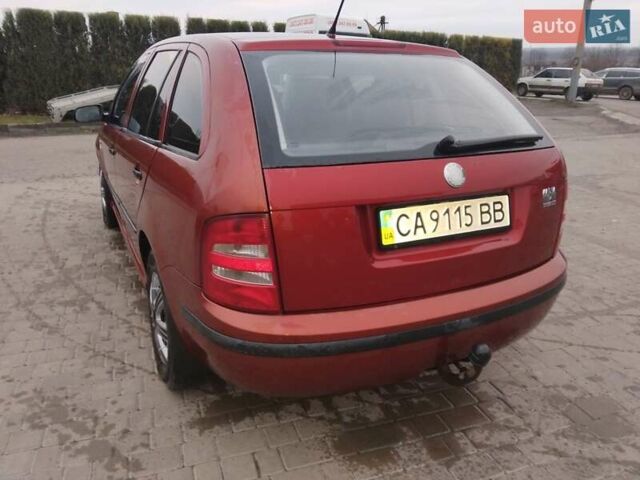 Красный Шкода Фабия, объемом двигателя 1.4 л и пробегом 237 тыс. км за 2500 $, фото 8 на Automoto.ua