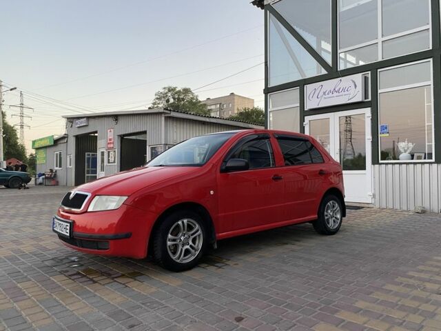 Красный Шкода Фабия, объемом двигателя 1.4 л и пробегом 225 тыс. км за 4000 $, фото 3 на Automoto.ua