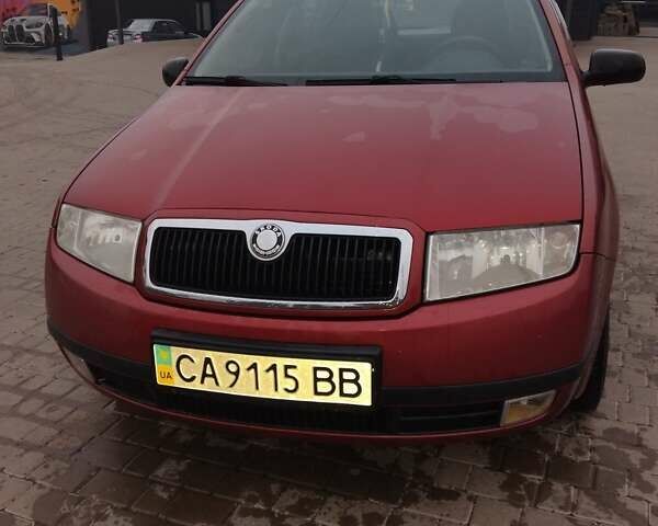 Красный Шкода Фабия, объемом двигателя 1.4 л и пробегом 237 тыс. км за 2500 $, фото 7 на Automoto.ua