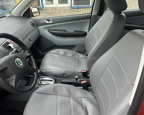 Червоний Шкода Фабія, об'ємом двигуна 1.39 л та пробігом 112 тис. км за 4850 $, фото 1 на Automoto.ua