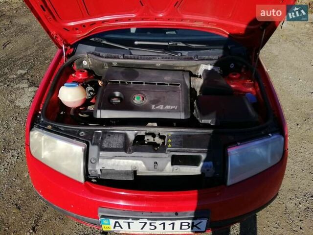 Красный Шкода Фабия, объемом двигателя 1.39 л и пробегом 229 тыс. км за 2600 $, фото 1 на Automoto.ua