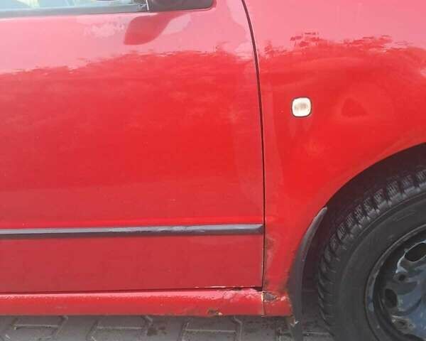 Красный Шкода Фабия, объемом двигателя 1.4 л и пробегом 386 тыс. км за 2950 $, фото 7 на Automoto.ua