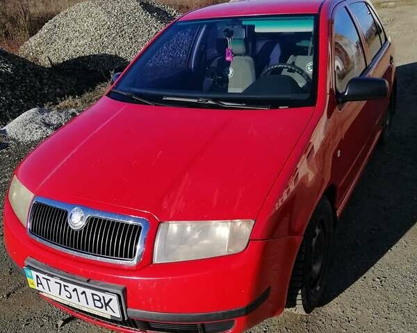 Красный Шкода Фабия, объемом двигателя 1.39 л и пробегом 229 тыс. км за 2600 $, фото 2 на Automoto.ua