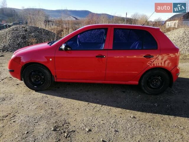Красный Шкода Фабия, объемом двигателя 1.39 л и пробегом 229 тыс. км за 2600 $, фото 3 на Automoto.ua