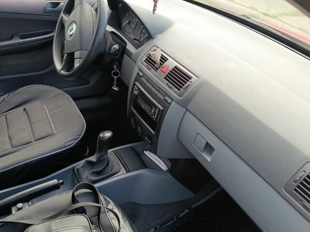 Червоний Шкода Фабія, об'ємом двигуна 1.4 л та пробігом 240 тис. км за 3300 $, фото 11 на Automoto.ua