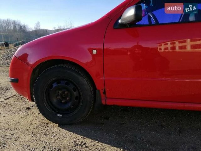 Красный Шкода Фабия, объемом двигателя 1.39 л и пробегом 229 тыс. км за 2600 $, фото 7 на Automoto.ua