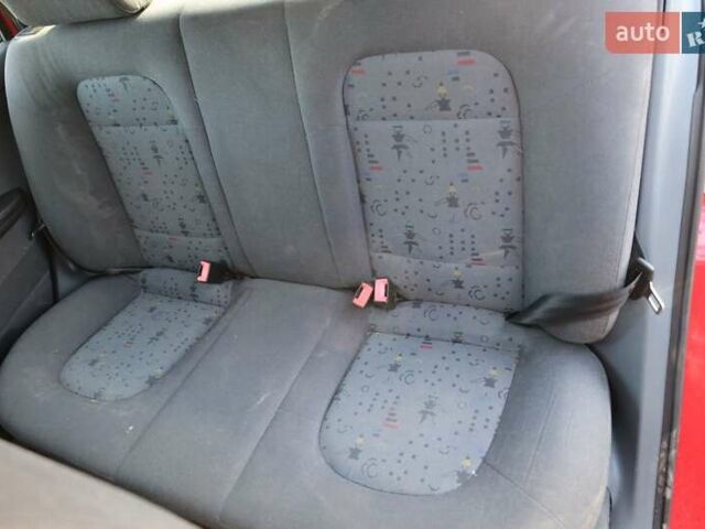 Красный Шкода Фабия, объемом двигателя 1.4 л и пробегом 386 тыс. км за 2950 $, фото 13 на Automoto.ua