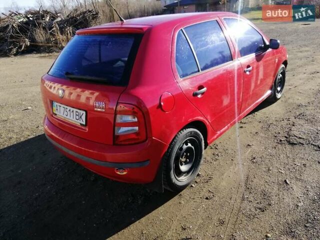 Красный Шкода Фабия, объемом двигателя 1.39 л и пробегом 229 тыс. км за 2600 $, фото 5 на Automoto.ua