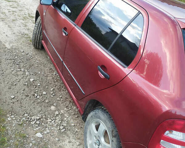 Красный Шкода Фабия, объемом двигателя 1.4 л и пробегом 120 тыс. км за 3900 $, фото 4 на Automoto.ua