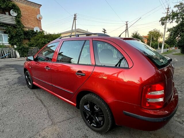 Красный Шкода Фабия, объемом двигателя 1.4 л и пробегом 247 тыс. км за 4200 $, фото 6 на Automoto.ua
