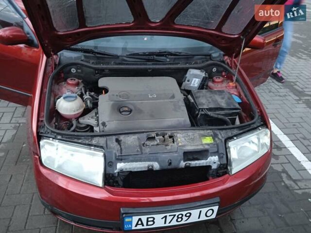 Красный Шкода Фабия, объемом двигателя 1.39 л и пробегом 226 тыс. км за 5400 $, фото 31 на Automoto.ua