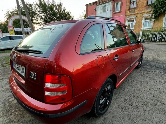 Красный Шкода Фабия, объемом двигателя 1.4 л и пробегом 247 тыс. км за 4200 $, фото 8 на Automoto.ua