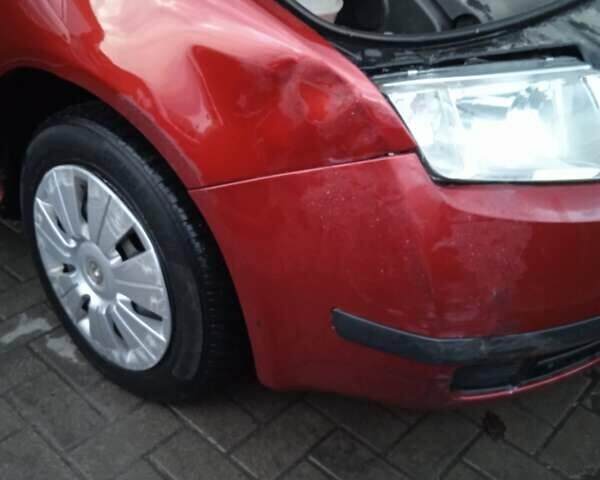 Красный Шкода Фабия, объемом двигателя 1.39 л и пробегом 226 тыс. км за 5400 $, фото 15 на Automoto.ua