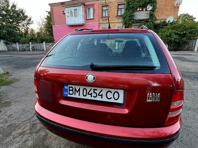 Красный Шкода Фабия, объемом двигателя 1.4 л и пробегом 247 тыс. км за 4200 $, фото 7 на Automoto.ua