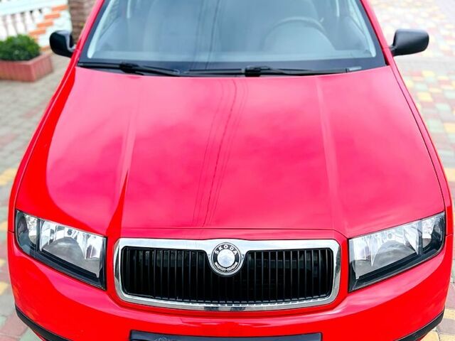 Красный Шкода Фабия, объемом двигателя 1.2 л и пробегом 211 тыс. км за 3850 $, фото 3 на Automoto.ua