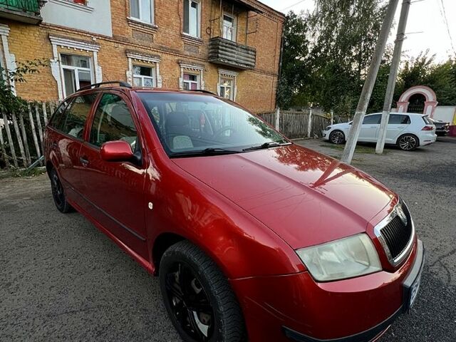 Красный Шкода Фабия, объемом двигателя 1.4 л и пробегом 247 тыс. км за 4200 $, фото 2 на Automoto.ua