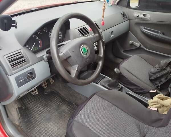 Красный Шкода Фабия, объемом двигателя 1.2 л и пробегом 295 тыс. км за 3000 $, фото 19 на Automoto.ua