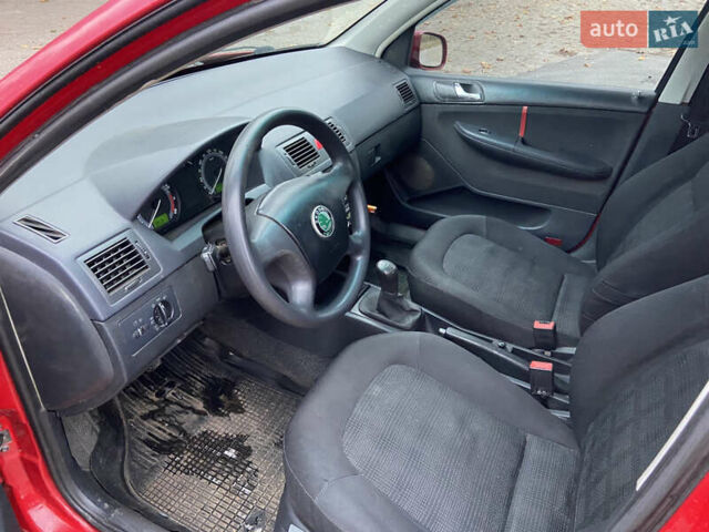 Червоний Шкода Фабія, об'ємом двигуна 1.39 л та пробігом 180 тис. км за 2350 $, фото 7 на Automoto.ua