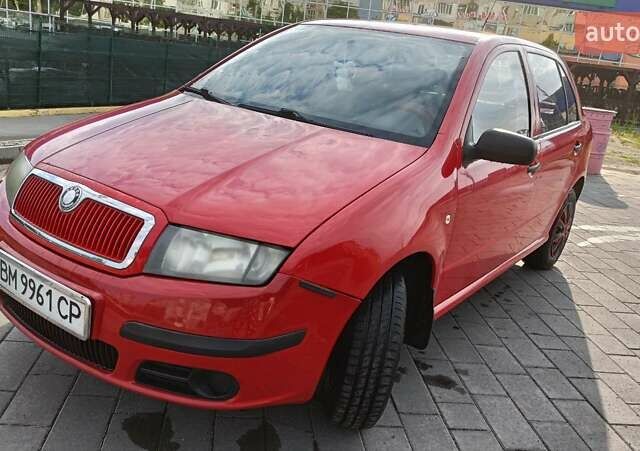 Красный Шкода Фабия, объемом двигателя 1.2 л и пробегом 184 тыс. км за 3000 $, фото 3 на Automoto.ua